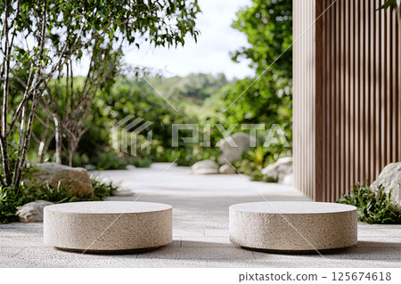 In a peaceful zen garden, a geometric stone podium showcases products, creating a calm atmosphere 125674618