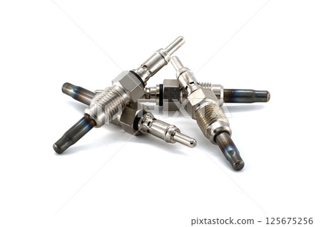 Close-Up of Glow Plugs for Diesel Engines Isolated on White Background Close-Up of Glow Plugs for Diesel Engines Isolated on White Background 125675256
