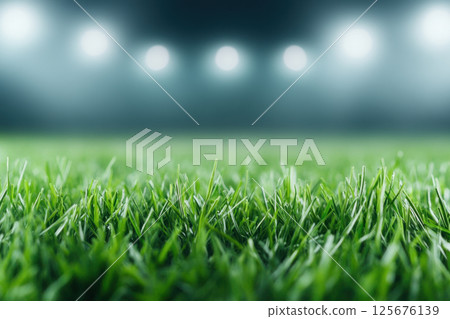 Close up of vibrant green grass on a sports field under bright stadium lights at night, AI Generative 125676139