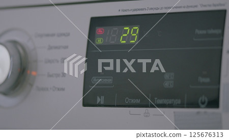 The Display on the Digital Control Panel of a Washing Machine for enhanced functionality 125676313