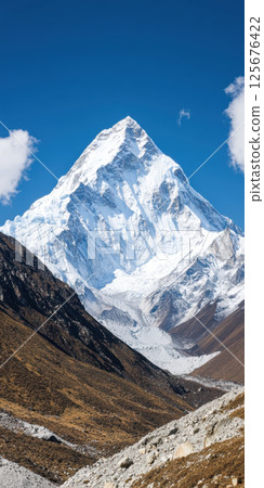 Majestic snow capped mountain peak under clear blue sky in pristine natural landscape, AI Generative 125676422
