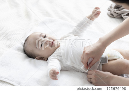 4 month old baby and mom 125676498