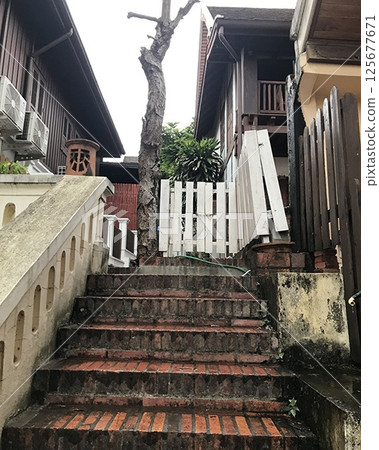 Scenery of a back alley in Luang Prabang, a world heritage town in Laos 125677671