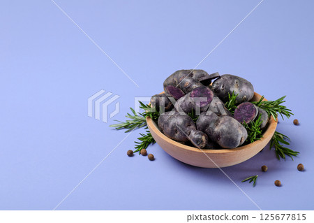 Concept of unusual vegetable - purple potato vegetable 125677815