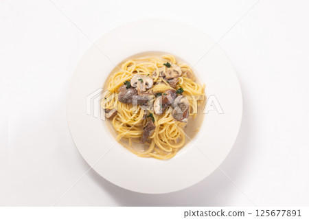 Porcini and mushroom cream pasta 125677891
