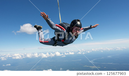 First time skydiving full of smiles 125677903