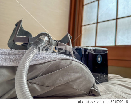 Futon and CPAP in the Japanese-style room at my parents' house Futon and CPAP in the Japanese-style room at my parents' house 125679648