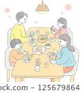 一家人在餐桌上吃米飯 125679864
