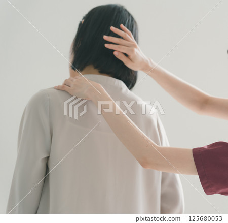 Neck pain treatment 125680053