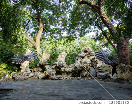 Stone platform on the rockery in a Chinese courtyard Stone platform on the rockery in a Chinese courtyard 125681380