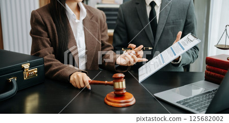 Business and Male lawyer or judge consult having team meeting with client, Law and Legal services concept.Customer service good cooperation in office 125682002