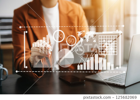Intelligence and business analytics with dashboard concept.Website designer working in come digital tablet laptop.and smart phone. Intelligence and business analytics with dashboard concept.Website designer working in come digital tablet laptop.and smart phone. 125682069