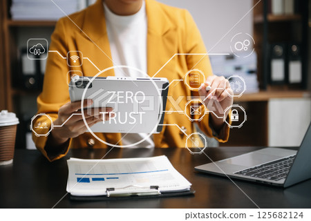 Zero trust security concept Person using computer and tablet with zero trust icon on virtual screen of Data businesses 125682124