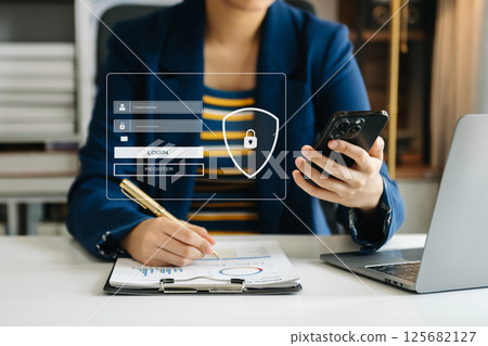 Cyber security concept, Login, User, identification information security and encryption, secure access to user's personal information woman using smart phone and tablet 125682127