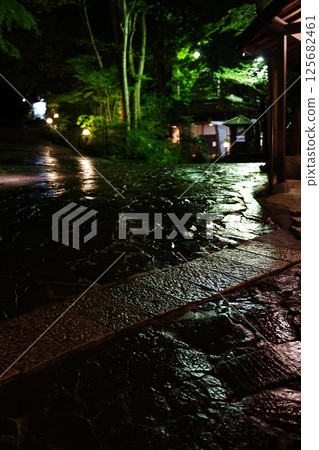 Rainy cobblestone 125682461