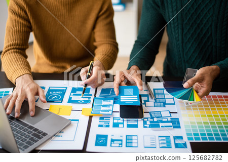 UX graphic designer planning application process development prototype wireframe for web smart phone. Creative digital development UX graphic designer planning application process development prototype wireframe for web smart phone. Creative digital development 125682782
