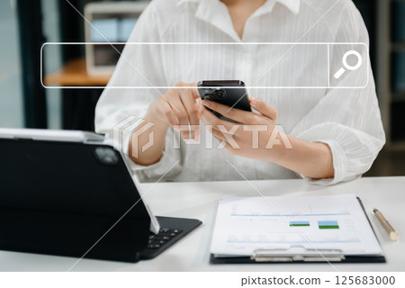Searching Browsing Internet Data Information Networking Concept with blank search bar.man working with mobile phone and laptop computer VR icon Searching Browsing Internet Data Information Networking Concept with blank search bar.man working with mobile phone and laptop computer VR icon 125683000