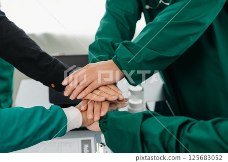 Team Doctors nurses union coordinate hands Teamwork Concept in hospital for success and trust in team. 125683052