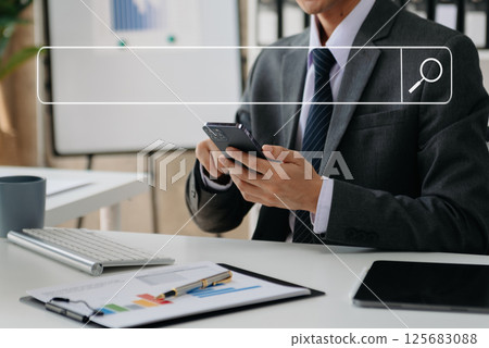 Searching Browsing Internet Data Information Networking Concept with blank search bar.man working with mobile phone and laptop computer VR icon Searching Browsing Internet Data Information Networking Concept with blank search bar.man working with mobile phone and laptop computer VR icon 125683088