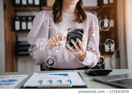 businesswoman hand working with laptop computer and tablet in modern office with virtual icon businesswoman hand working with laptop computer and tablet in modern office with virtual icon 125683609