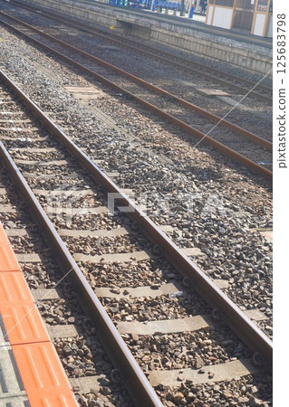 A long train track leading from the station platform in Mito City, Ibaraki Prefecture 125683798
