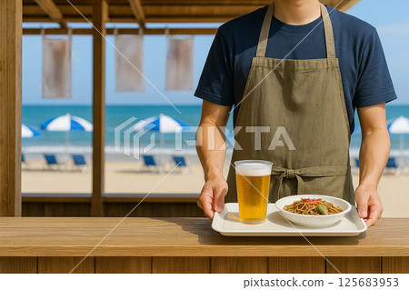 Staff serving food and drinks at the beach house Staff serving food and drinks at the beach house 125683953