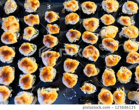 Amateur-made sushi at home. Imperfect homemade sushi. Authentic image for DIY, culinary blogs. Amateur-made sushi at home. Imperfect homemade sushi. Authentic image for DIY, culinary blogs. 125686135