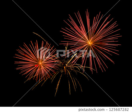 Red firework sparkling on black background for celebration and anniversary Red firework sparkling on black background for celebration and anniversary 125687282