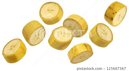 Falling banana slices isolated on white background with clipping path, full depth of field 125687367