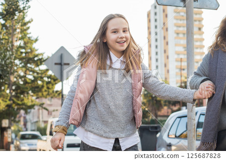 Happy joyful child girl outdoors Happy joyful child girl outdoors 125687828