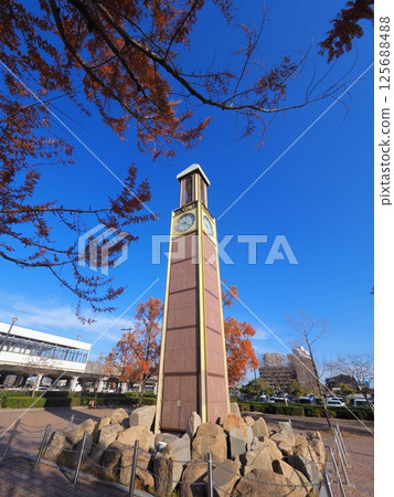 Clock tower in front of Utazu Station - Autumn leaves [Utazu Town, Ayauta District, Kagawa Prefecture] 7 125688488