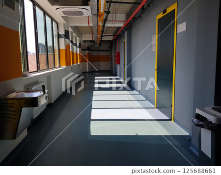 Modern office lobby with empty corridor, business interior background Modern office lobby with empty corridor, business interior background 125688661