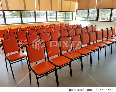 Chairs in an empty business meeting office room indoor Chairs in an empty business meeting office room indoor 125688662