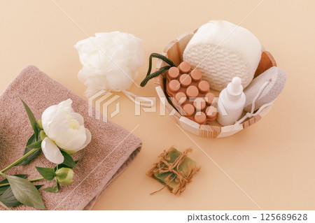 Spa products for facial and body care with soft terry towel. 125689628