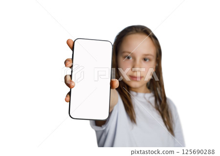 Child girl showing smartphone with blank empty white screen display for new Application  125690288