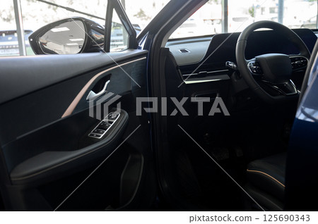 Car interior - steering wheel, shift lever and dashboard. Car modern inside. Car interior - steering wheel, shift lever and dashboard. Car modern inside. 125690343