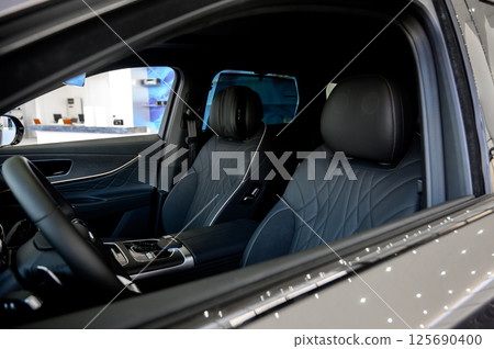 Interior of a modern car with black leather seats 125690400