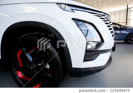Car wheel with brake calipers and stylish design. Car wheel with brake calipers and stylish design. 125690475