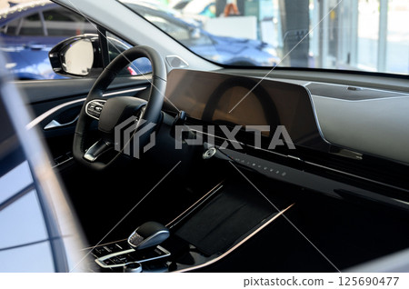 Car interior - steering wheel, shift lever and dashboard. Car modern inside. Car interior - steering wheel, shift lever and dashboard. Car modern inside. 125690477