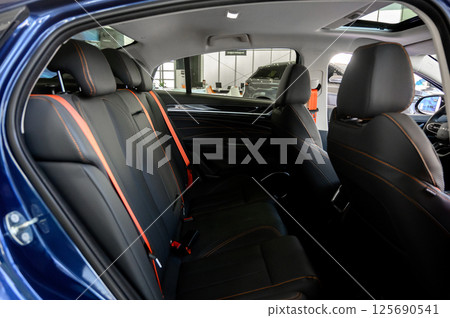 Interior of a modern car with black leather seats 125690541
