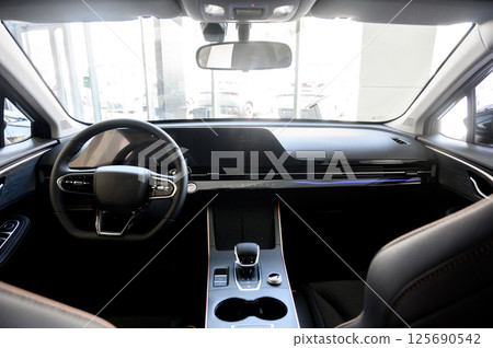 Interior of a modern car with black leather seats 125690542