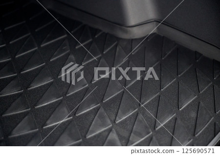 Large black empty car trunk. Open car trunk close up Large black empty car trunk. Open car trunk close up 125690571