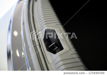 Large black empty car trunk. Open car trunk close up 125690590