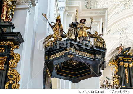 Passau, Germany - Apr 16, 2025: The interior of Parochial Church St Paul, the oldest parish church of Passau, Germany Passau, Germany - Apr 16, 2025: The interior of Parochial Church St Paul, the oldest parish church of Passau, Germany 125691983