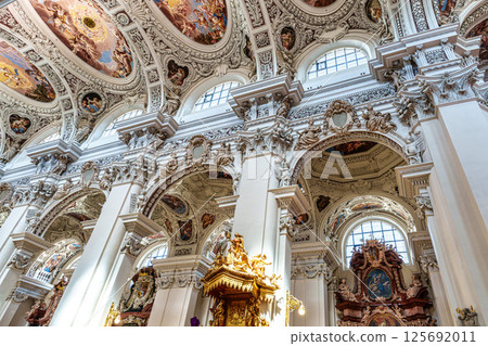 Passau, Germany - Apr 16, 2025: Interior of St. Stephans cathedral in Passau, Germany with famous organ pipes Passau, Germany - Apr 16, 2025: Interior of St. Stephans cathedral in Passau, Germany with famous organ pipes 125692011