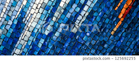 Abstract horizontal background made of small blue and white tiles arranged in geometric lines. Banner mosaic texture with futuristic clean layout and copy space Abstract horizontal background made of small blue and white tiles arranged in geometric lines. Banner mosaic texture with futuristic clean layout and copy space 125692255