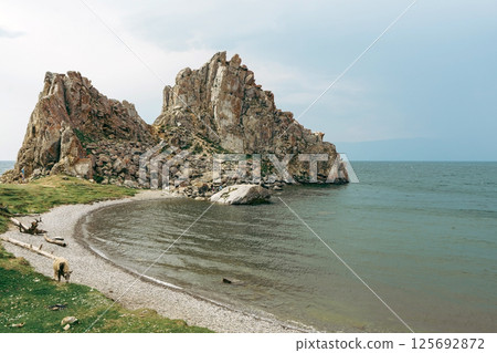 Shamanka rock at Olkhon Island in Baikal lake. Summer natural landscape 125692872