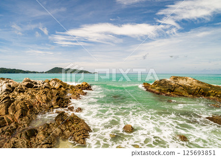 Top view waves crashing on rocks seascape background,Wide angle sea nature background 125693851