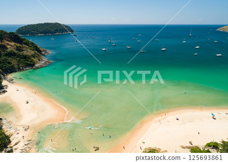 Aerial view of a blue sea surface water texture background and sun reflections Aerial flying drone view Waves water surface texture on sunny tropical ocean in Phuket island Thailand 125693861