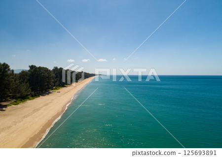 Aerial view of a blue sea surface water texture background and sun reflections Aerial flying drone view Waves water surface texture on sunny tropical ocean in Phuket island Thailand Aerial view of a blue sea surface water texture background and sun reflections Aerial flying drone view Waves water surface texture on sunny tropical ocean in Phuket island Thailand 125693891